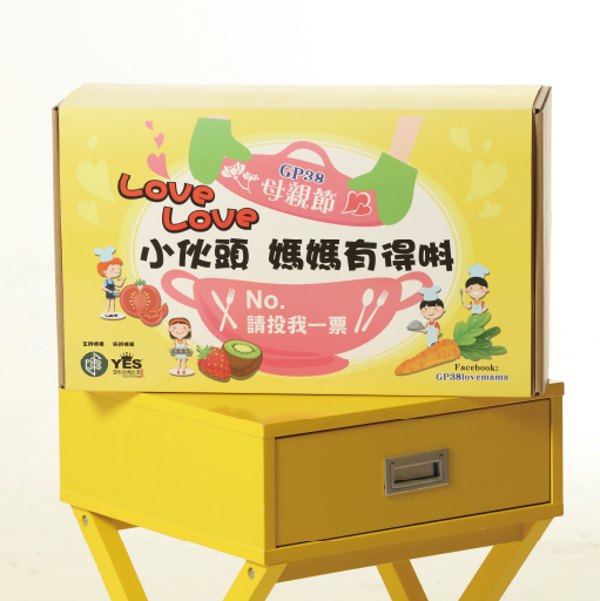Mockup of colorful mailer boxes displayed on a yellow table