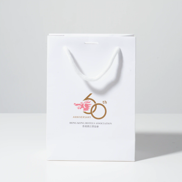 A sample of a round rope tote bag is shown against a grey and white background.
