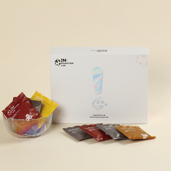 The picture shows a magnetic book-shaped hard box decorated with handmade cookie packaging
