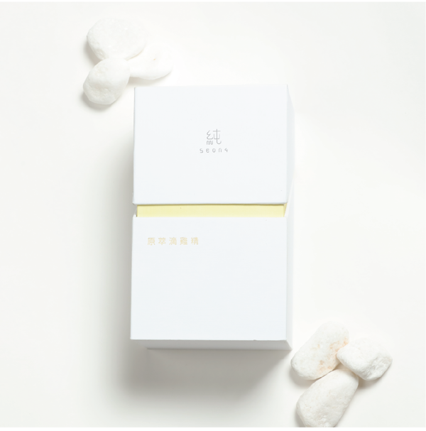 A mockup of a candle rigid box is shown on a white background