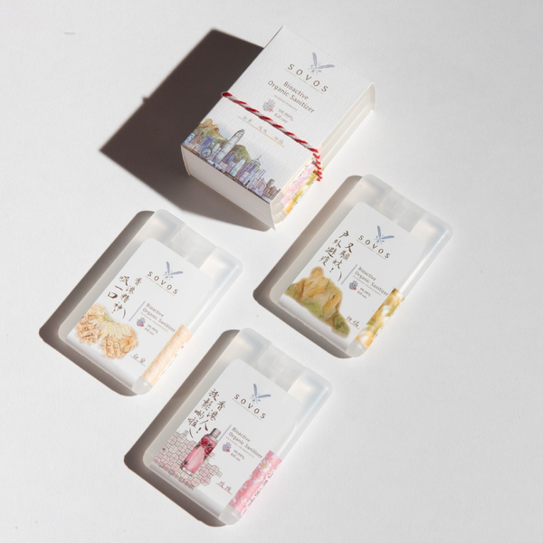 The image shows four SOVOS brand aromatherapy products, all placed on a bright background. Product packaging features the brand’s blue logo and colorful illustrations of various natural ingredients.