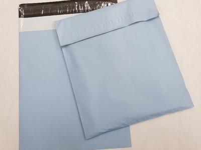 Gravure-printed PVC shrink packaging bag with self-adhesive seal for shoes