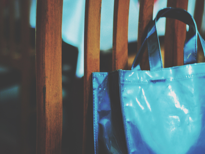 Custom printed plastic shopping bags with loop handles