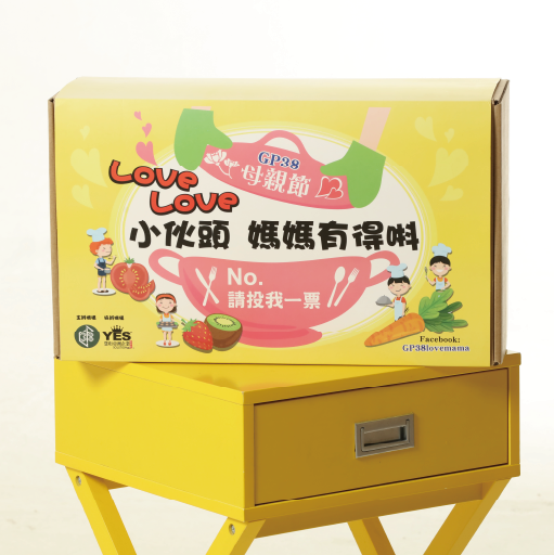 Mockup of colorful mailer boxes displayed on a yellow table