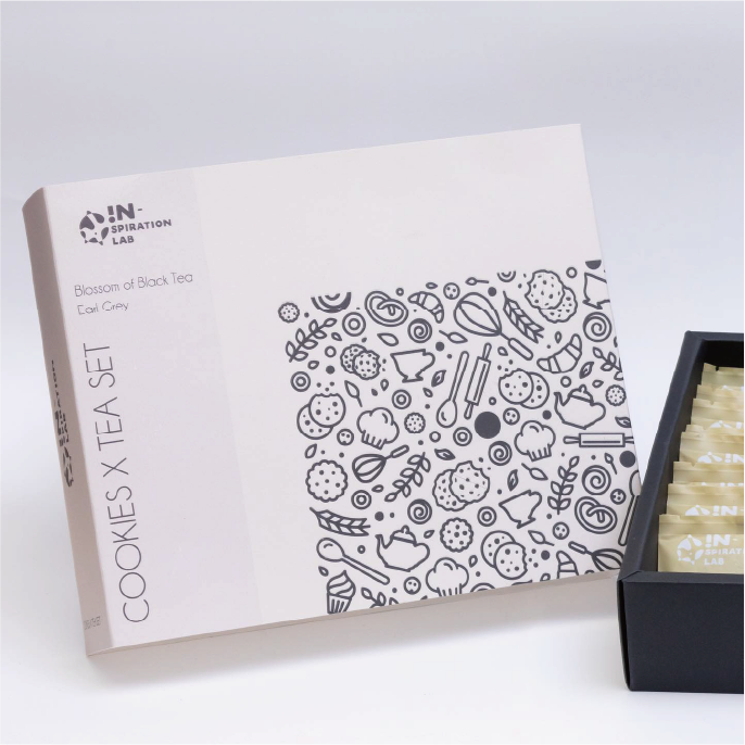 A matchbox printed in CMYK is displayed against a white background.