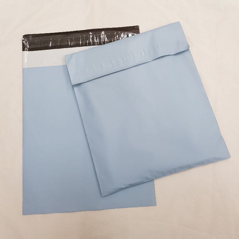 Gravure-printed PVC shrink packaging bag with self-adhesive seal for shoes