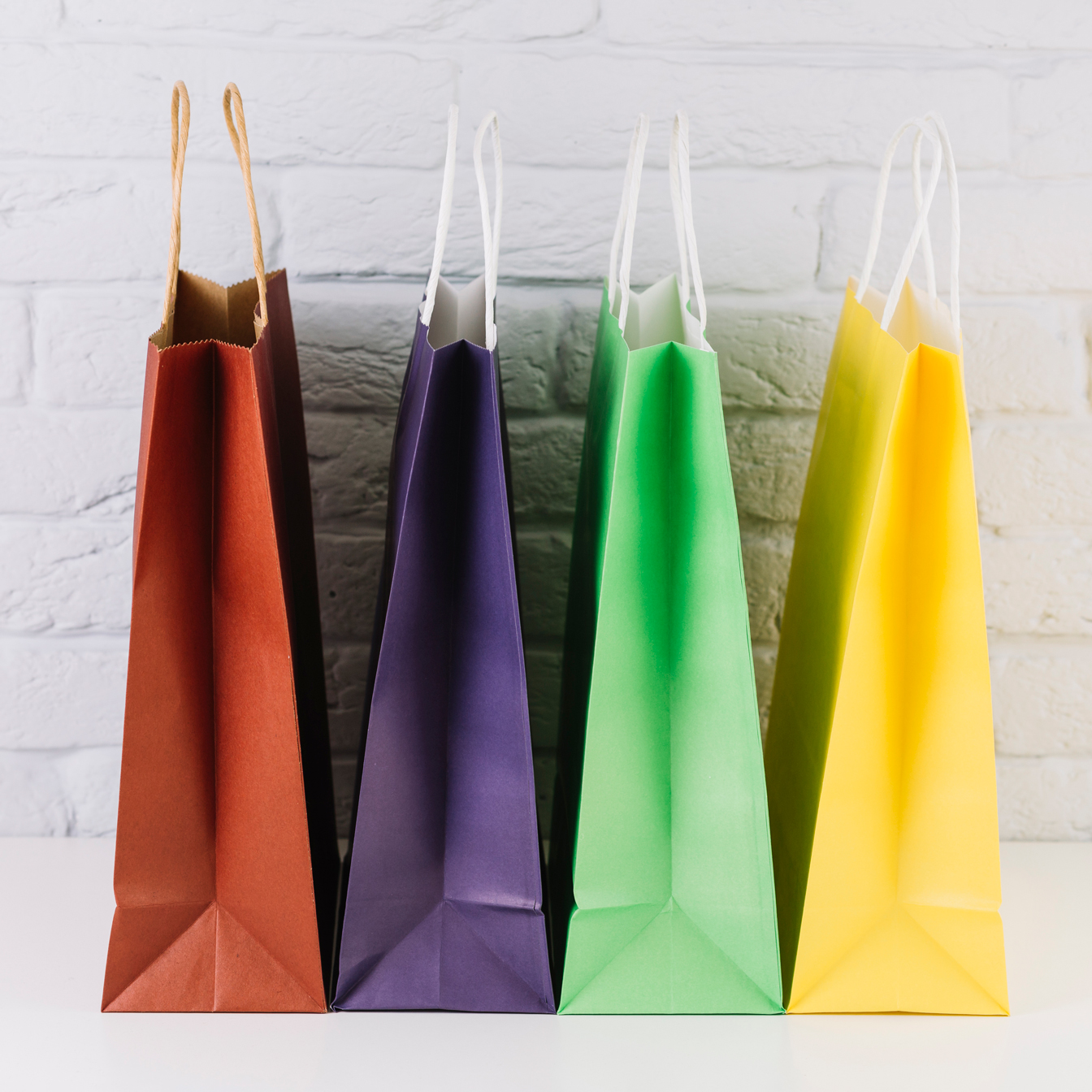 Natural kraft paper shopping bags with twisted paper handles